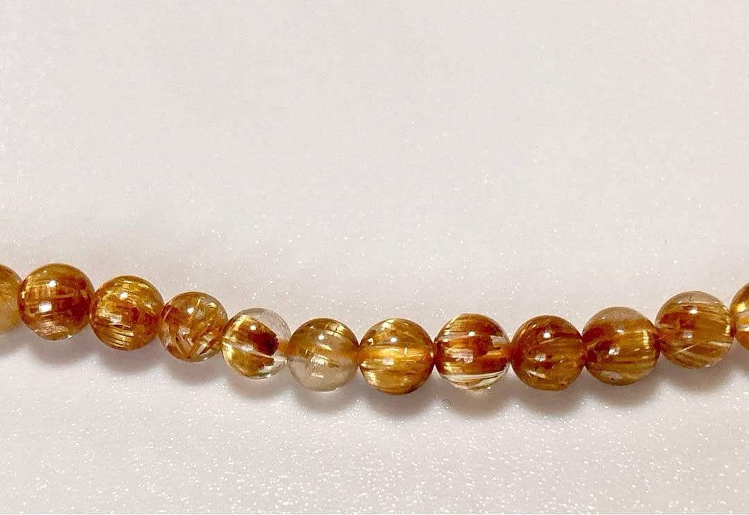 究極品質　超希少幻の逸品　天然石の王者　タイチンルチルキャッツアイの多重編み
