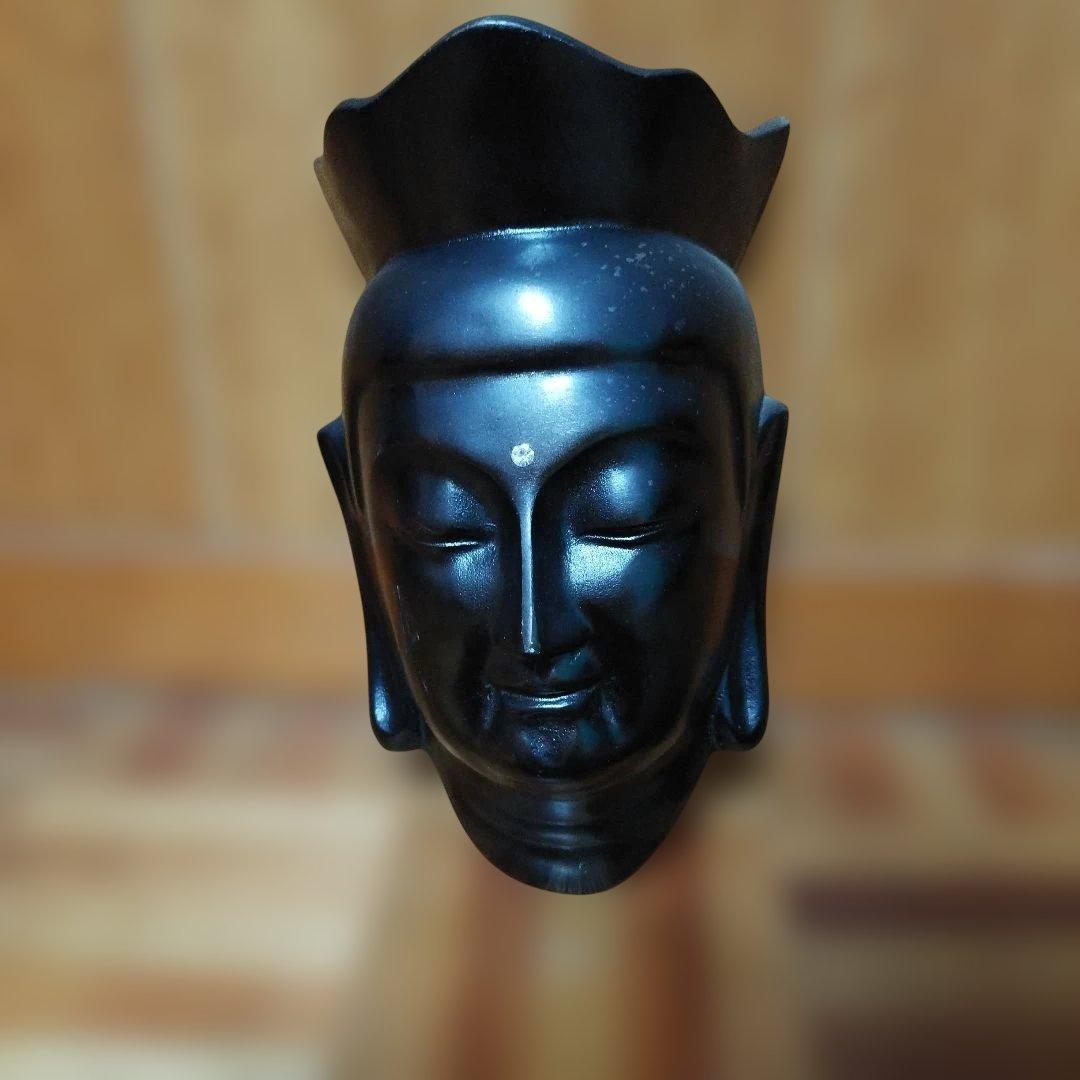 黒色金属製仏像の頭部
