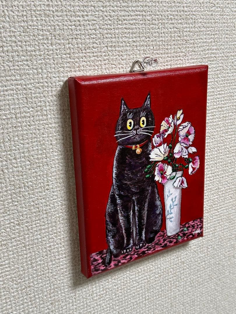 赤い部屋のクロネコ
