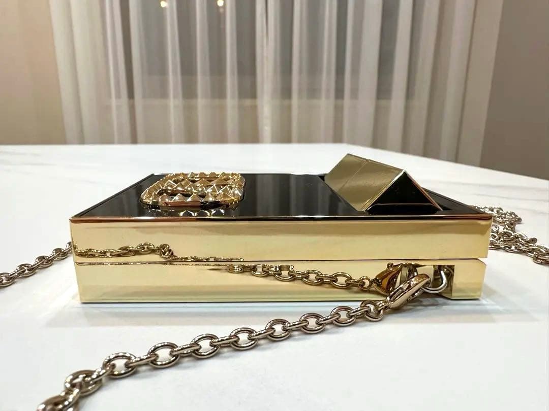 新品 VALENTINO GOクラッチ ＆ 口紅(ミニロッソ）
