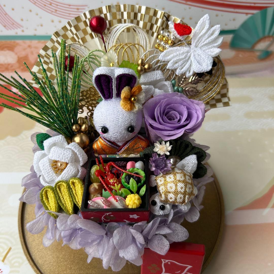 ハンドメイド❣️パープルお正月アレンジ❣️おせち、椿、プリザーブドフラワー薔薇❁⃘*