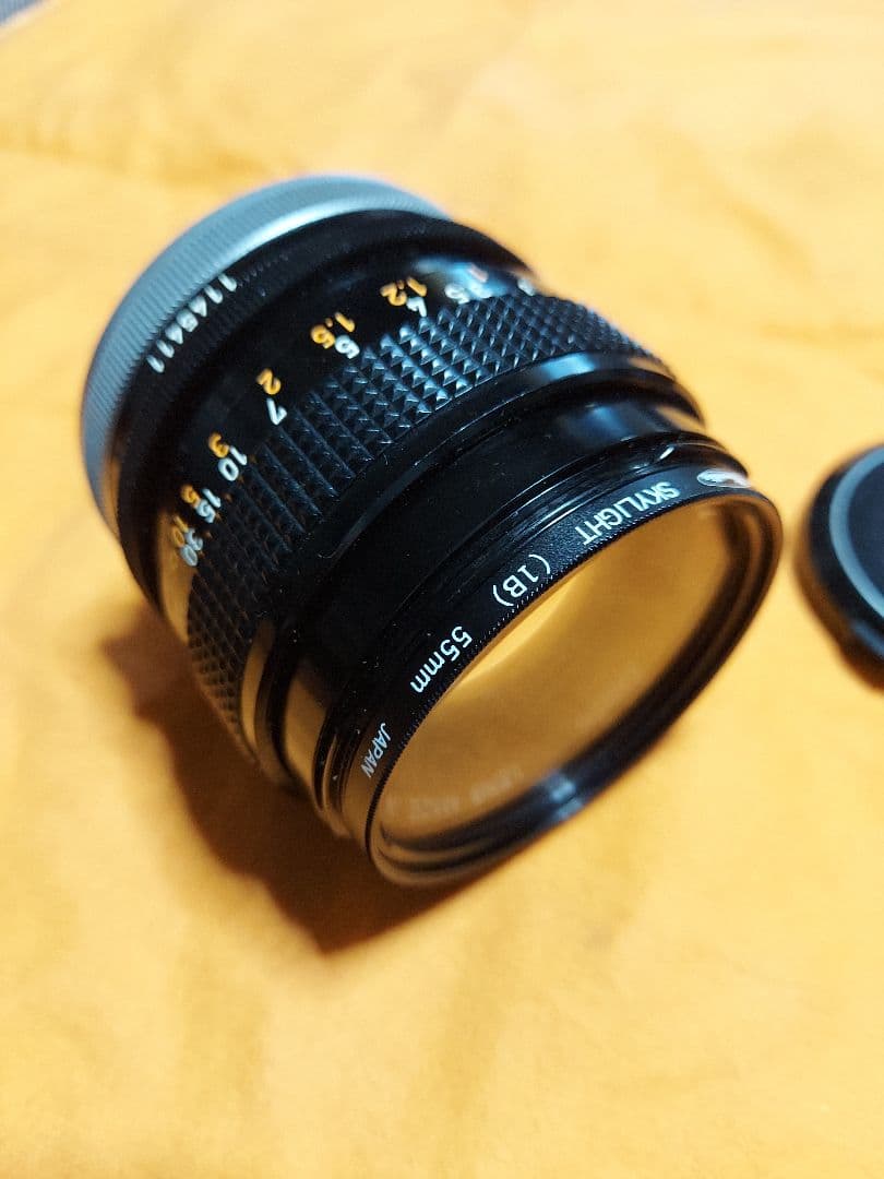 Canon F1 50MM 1.4 レンズ、ストラップ付き。
