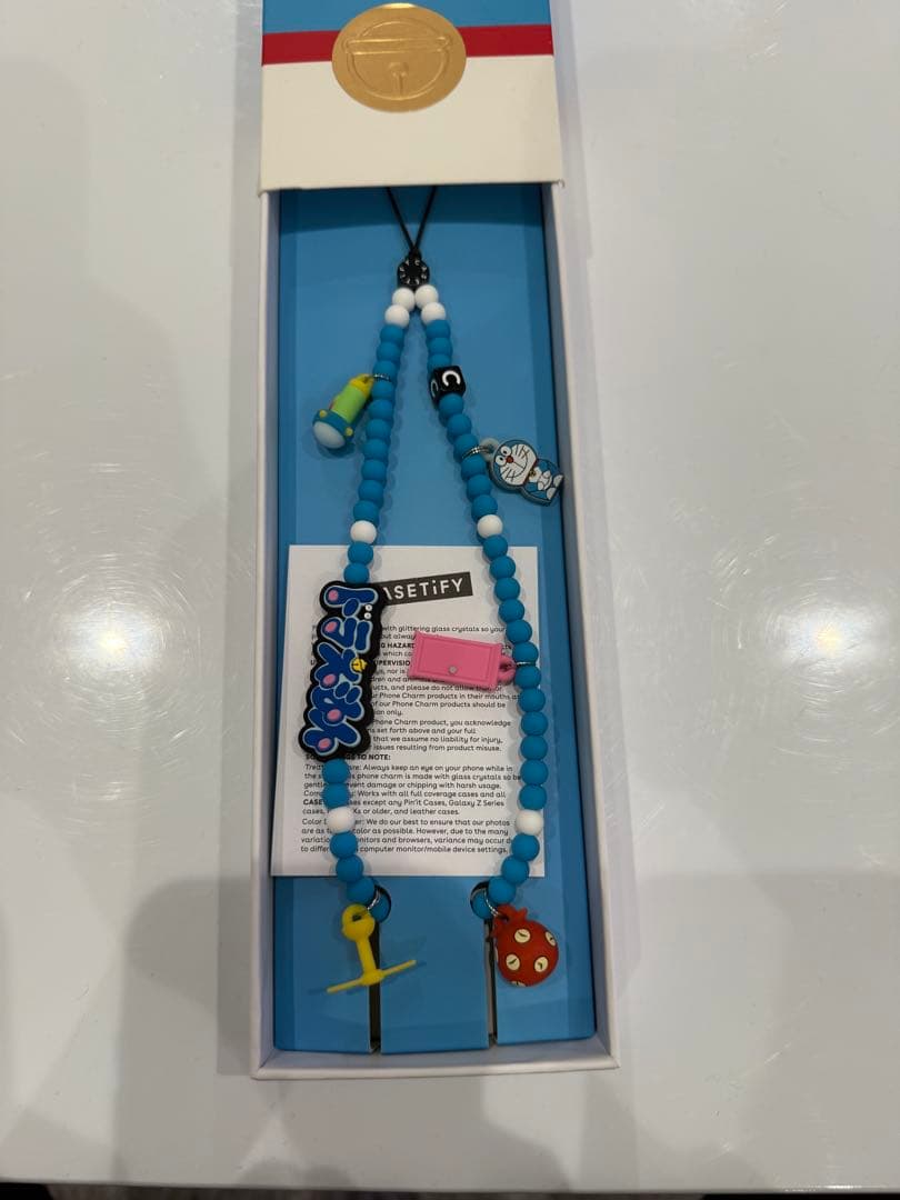 CASETiFY ドラえもんキャラクター付きストラップ