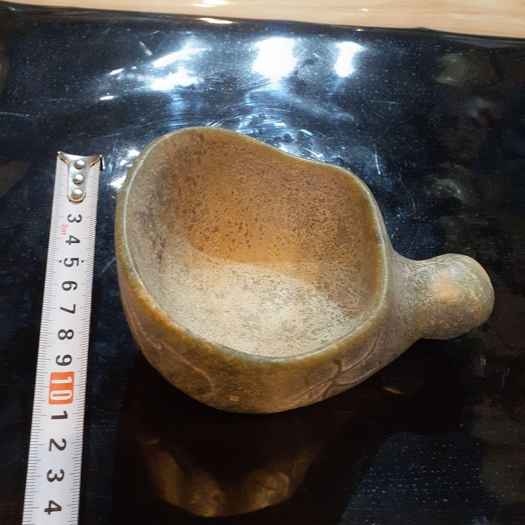 硬玉人面器