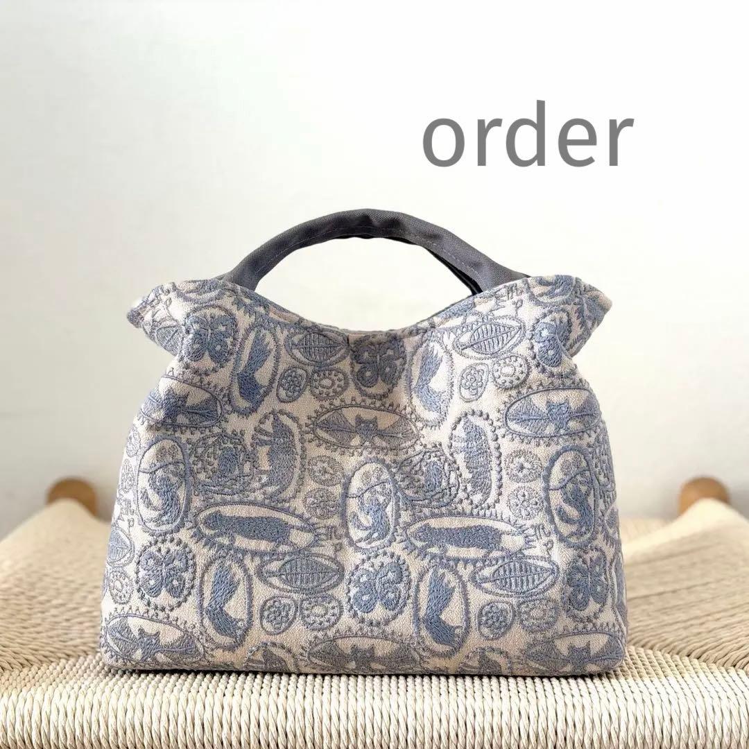 ⚮̈ミナペルホネン　jungle relief gray ヌッピバッグ