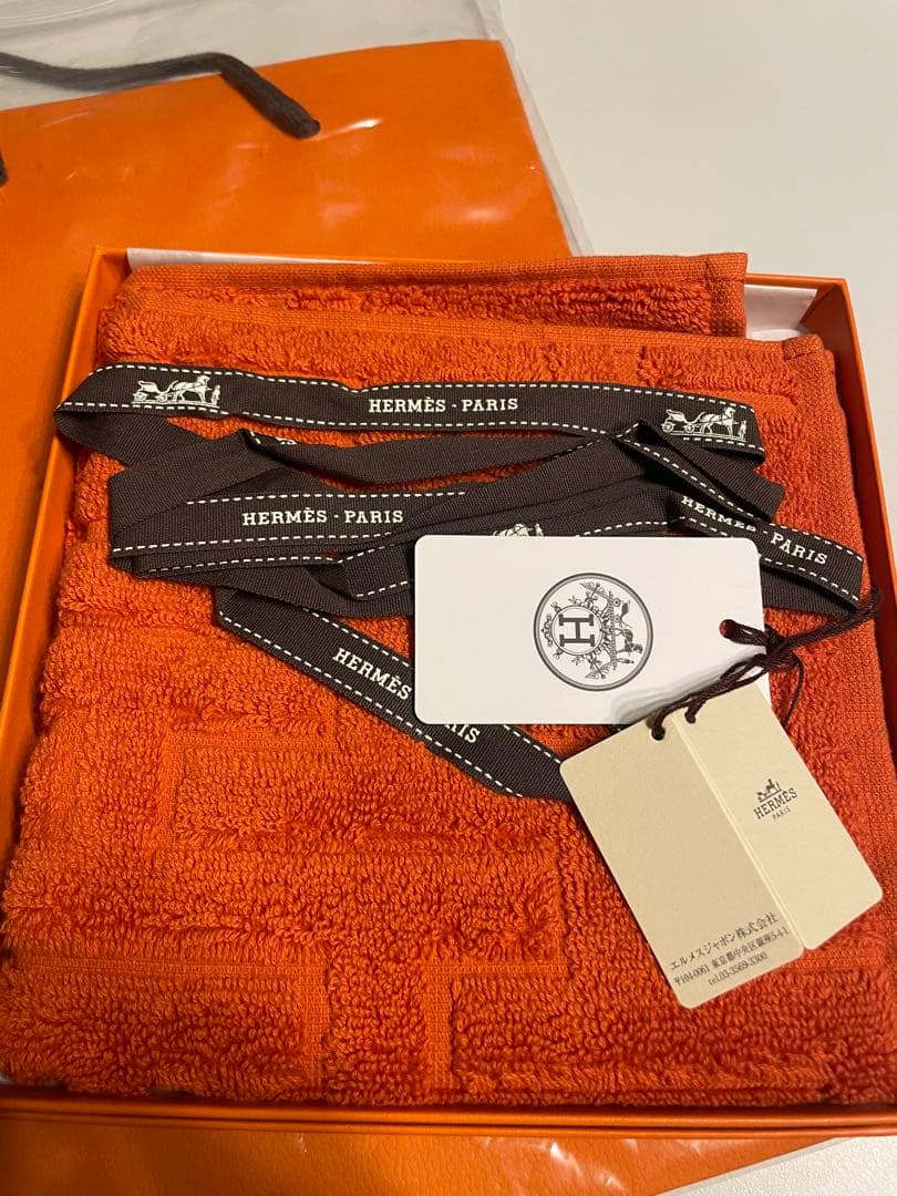 ショッパー付き　HERMES ハンドタオル ステアーズ オレンジ
