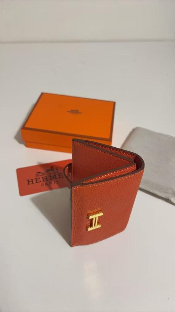 オレンジレッド 二つ折り財布