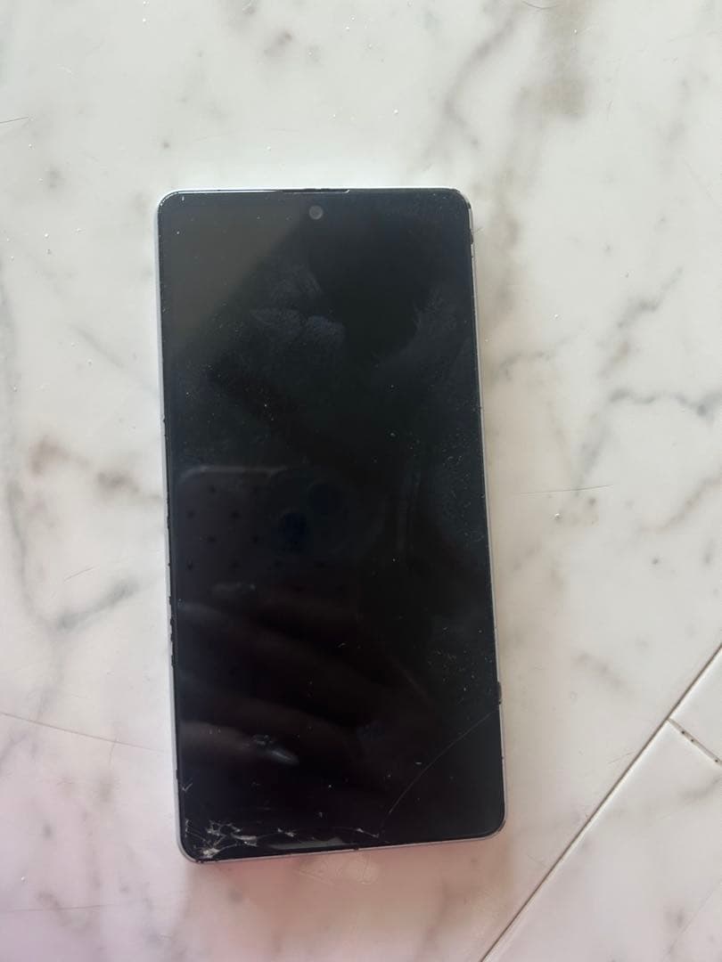 Sony Xperia シルバー トムとジェリーケース付き