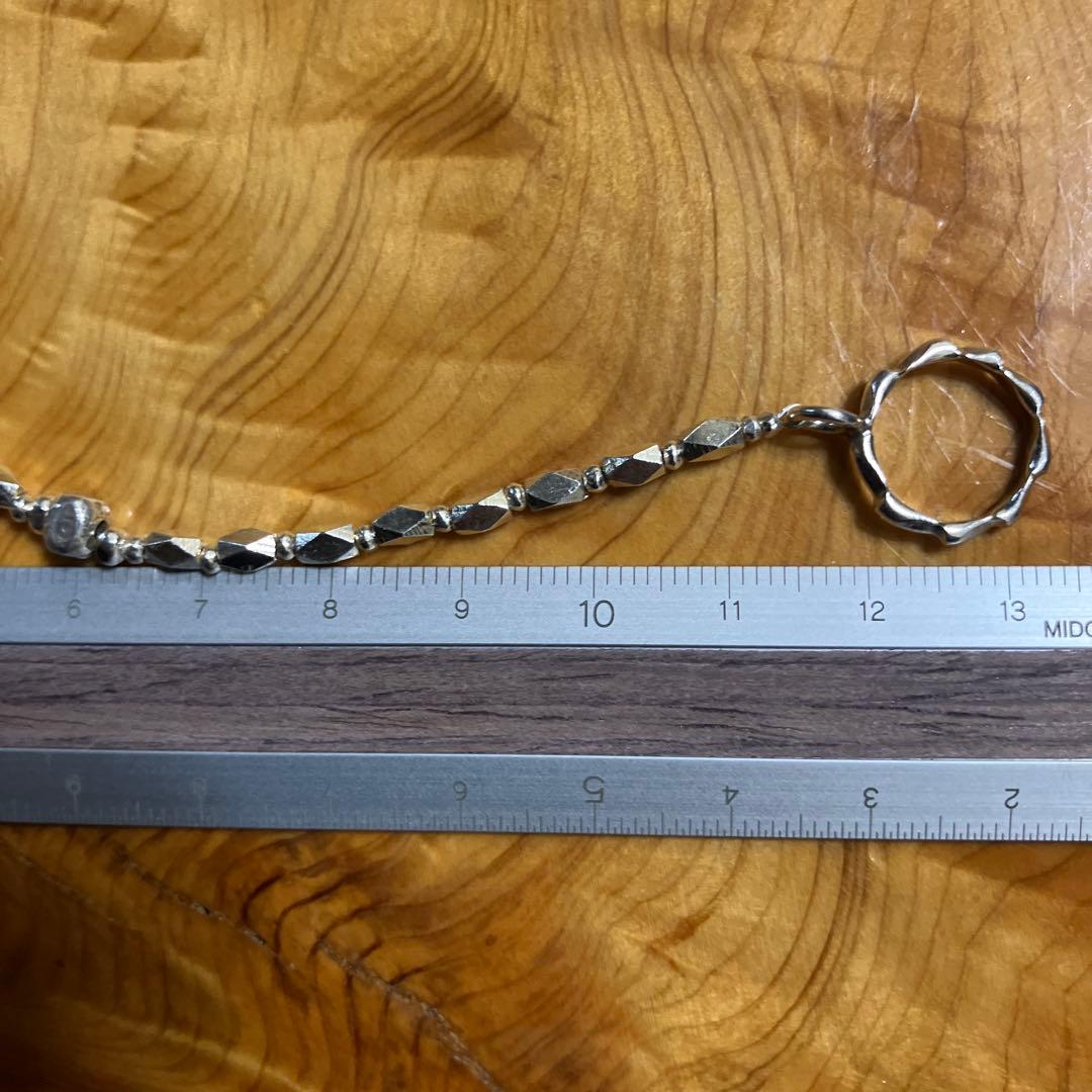 カレンシルバー　ダイヤ型ファセットと眼のソリッドビーズ　ブレスレット