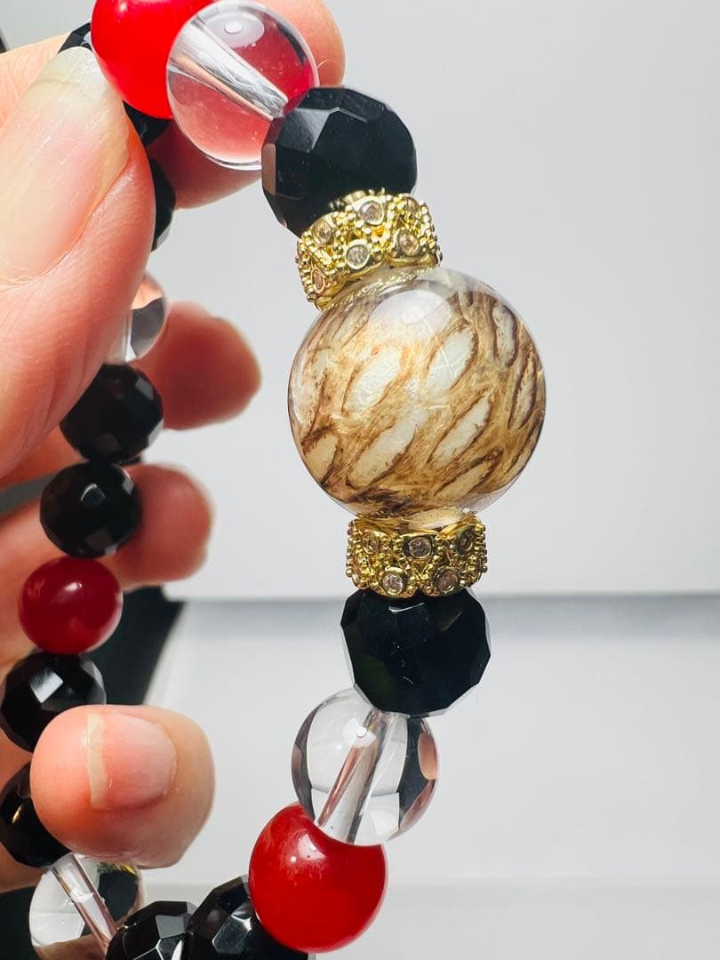 沖縄ハブ琉石水晶と秘紅石 オニキス超金運ブレスレット❗️宝くじ運　すごい波動