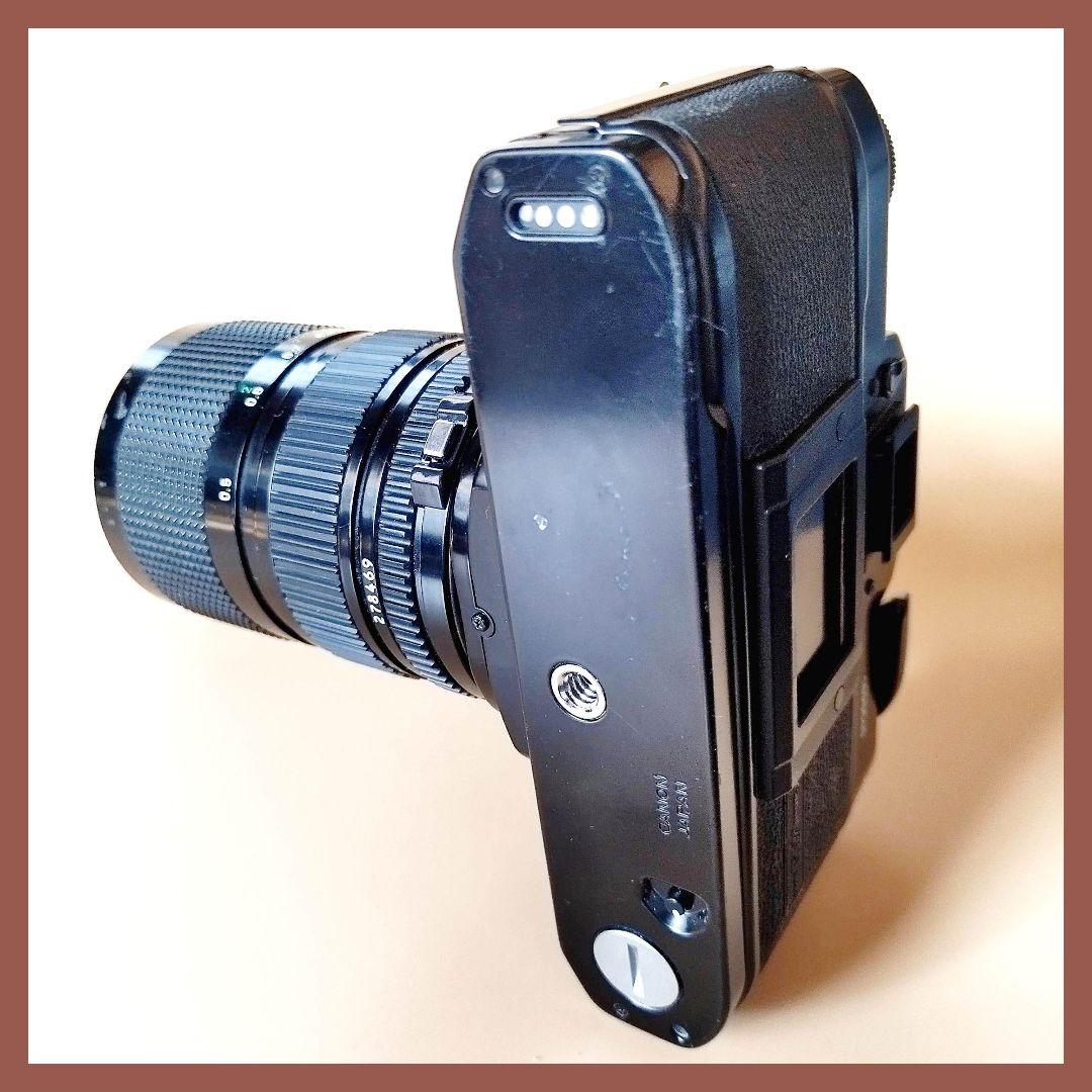 Canon A-1 フィルム一眼レフカメラFD 35-70mmレンズ付き。