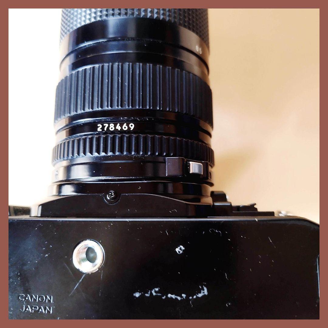 Canon A-1 フィルム一眼レフカメラFD 35-70mmレンズ付き。